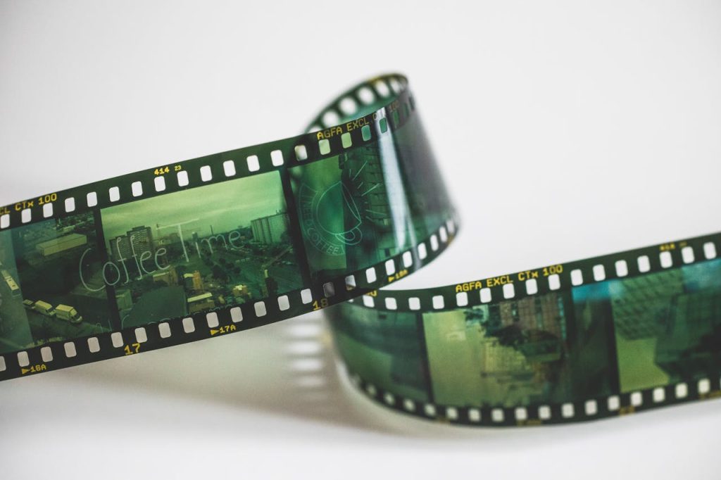 pexels-photo-6879095 Close-up of a vintage AGFA filmstrip with cinematic exposures, evoking nostalgia.